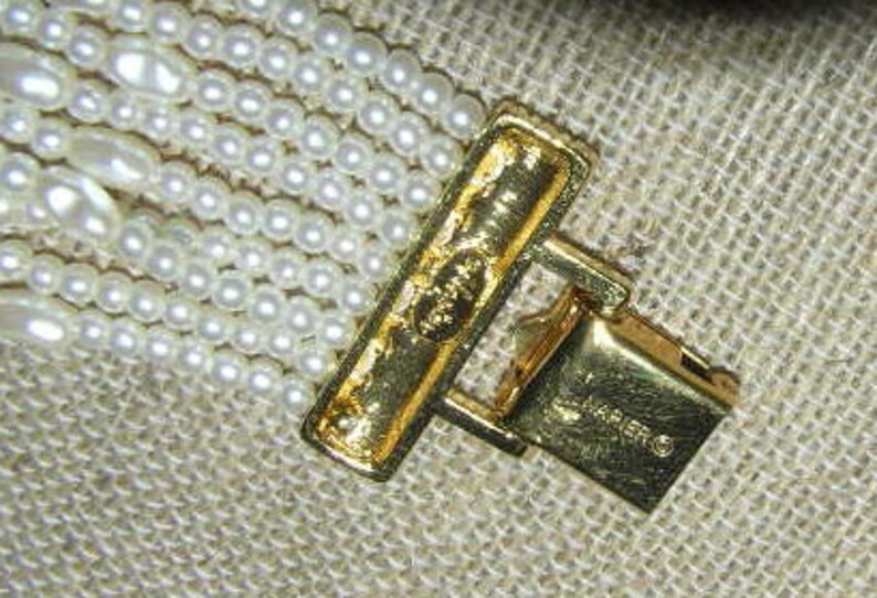 NAPIER Nine-Strand Vintage Faux Pearl Bracelet