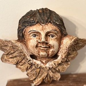 Antique Carved Polychrome Wood Cherub with Glass Eyes