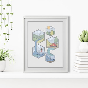 May include: A framed cross-stitch embroidery featuring five interconnected hexagonal panels depicting a nature scene. The design includes a lighthouse, a waterfall, a tent, mountains, and a sun, all rendered in various geometric patterns and colors.