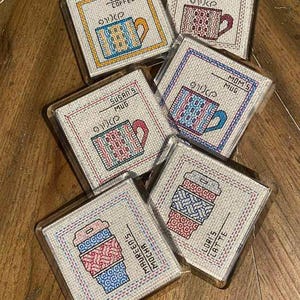 An image of a Blackwork & Cross Stitch Pattern created by Peppermint Purple called Blackwork & Cross Stitch Pattern - Personalised Drinks Coasters by Peppermint Purple