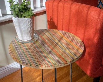 Round end table made from Recycled Skateboards
