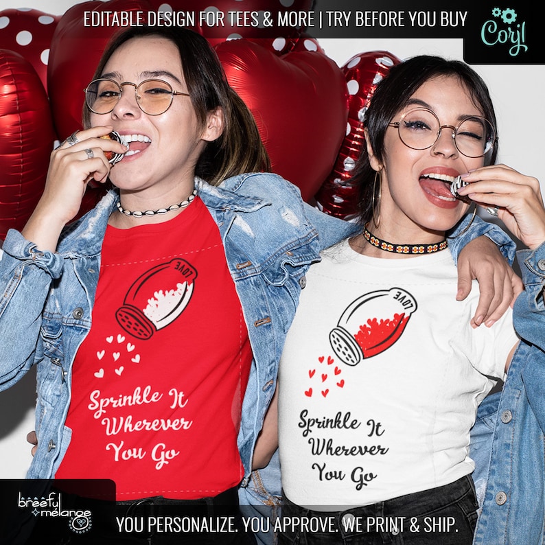 May include: Two women wearing white and red t-shirts with a graphic of a salt shaker pouring out hearts. The text on the shirts reads "Sprinkle It Wherever You Go".