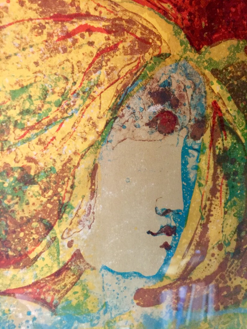 May include: Abstract painting of a woman's face with yellow, red, blue, and green colors. The woman's face is in profile and her hair is flowing.