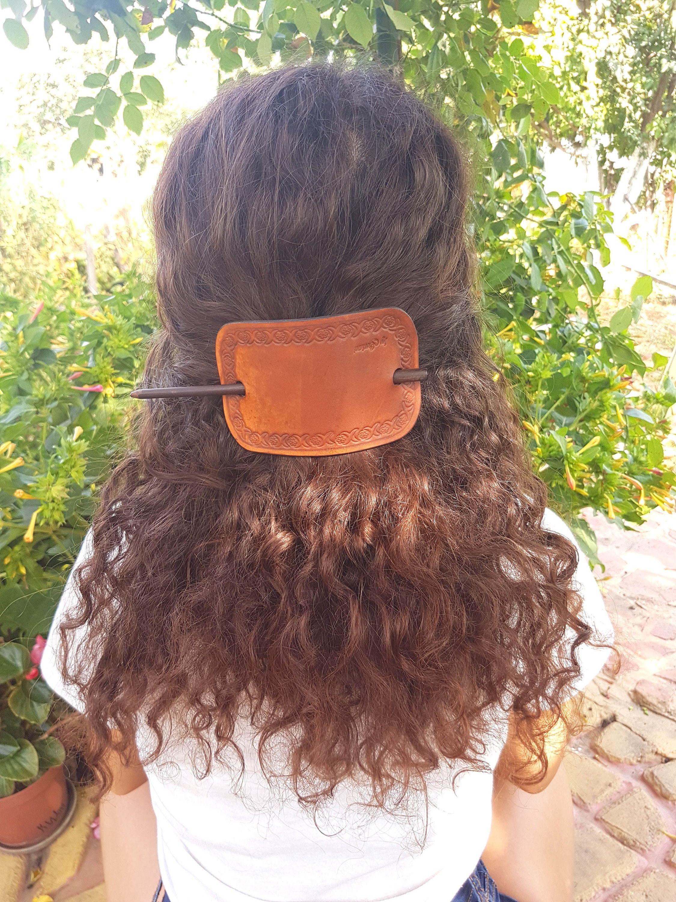 leather and stick hair accessories