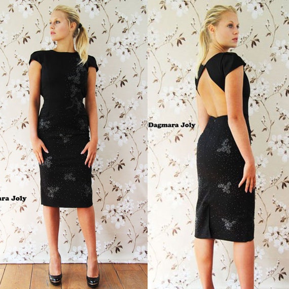 black dress below knee with sleeves