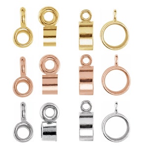 May include: Set of nine gold, rose gold, and silver bead caps with a round opening. Each cap has a loop at the top for attaching to a chain or cord.
