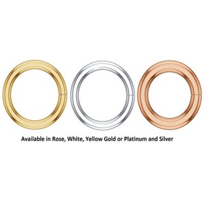 May include: Three round metal rings in different colors: gold, silver, and rose gold. Available in Rose, White, Yellow Gold or Platinum and Silver.