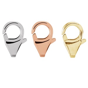 May include: Three lobster claw clasps in silver, rose gold, and gold.