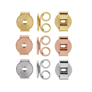 May include: Three sets of earring backs in gold, rose gold, and silver. Each set includes a round back and a butterfly back.