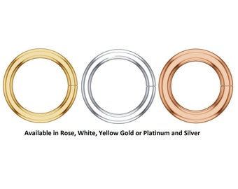 May include: Three hoop earrings in different metal finishes: gold, silver, and rose gold. Available in Rose, White, Yellow Gold or Platinum and Silver.