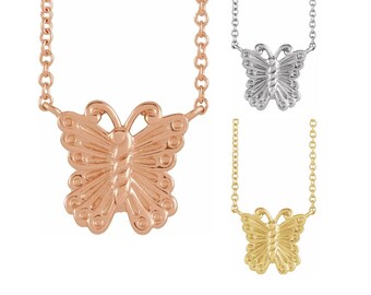 May include: Three gold butterfly necklaces with delicate chains. The butterflies are in rose gold, silver, and yellow gold.