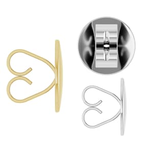 May include: A set of earring backs featuring a gold-toned piece shown from the side, a silver-toned piece shown from the side, and a silver-toned piece shown from the back, each with a heart-shaped wire loop design for securing earring posts.