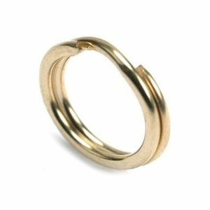 May include: A gold-colored metal key ring with a double loop design.