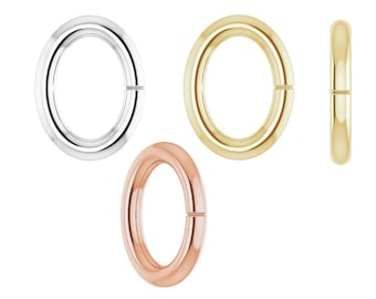 May include: Three jump rings in different metal finishes: silver, gold, and rose gold. The rings are all the same size and shape, and they are all open.