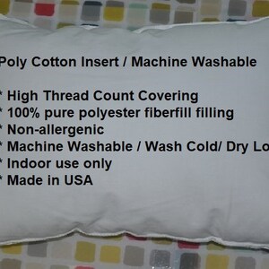 May include: White pillow with a white trim. The pillow has text that reads "Poly Cotton Insert / Machine Washable * High Thread Count Covering * 100% pure polyester fiberfill filling * Non-allergenic * Machine Washable / Wash Cold/ Dry Low * Indoor use only * Made in USA"