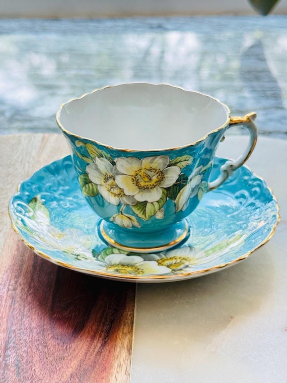 Rare Vintage Aynsley Teacup & Saucer. C1087 Turquoise Teal Blue with Large White Dogwood Blossoms. English Fine Bone China. Collectible Set.