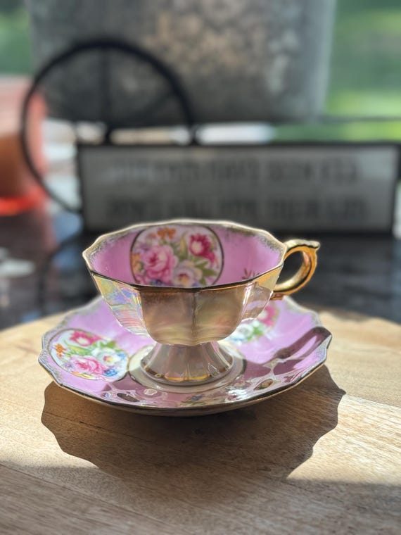 Vintage Pink Lusterware Teacup and Saucer Set. Iridescent Pedestal Tea Cup with Floral Bouquet & Heavy Gold Gilt Accents. Sterling China