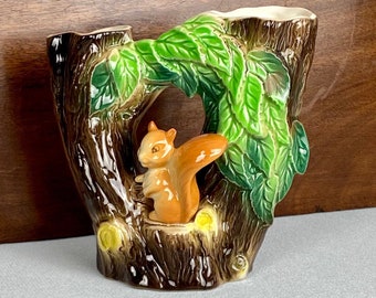 Hornsea bud vase featuring a tree and a Squirrel c1960s