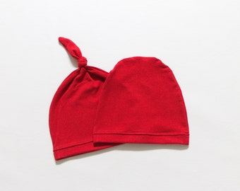 red baby cap