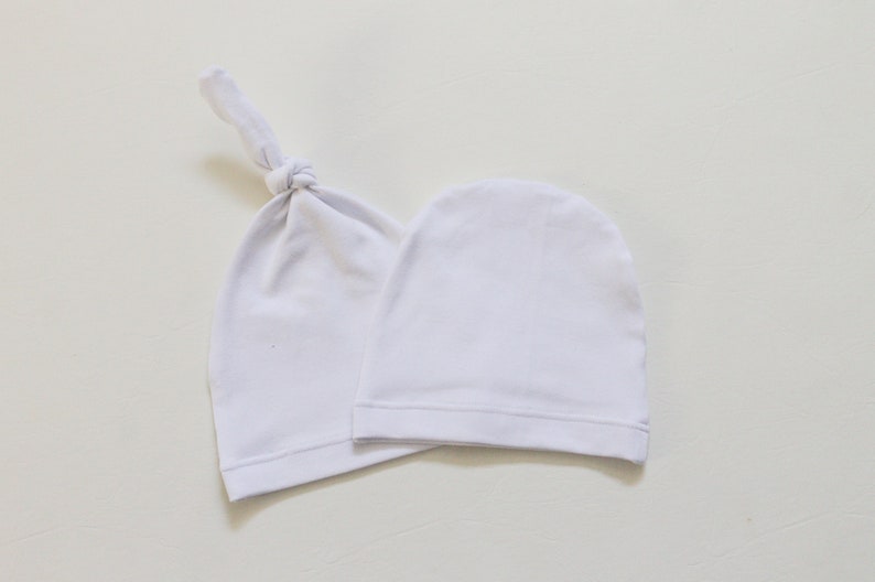 white infant hat