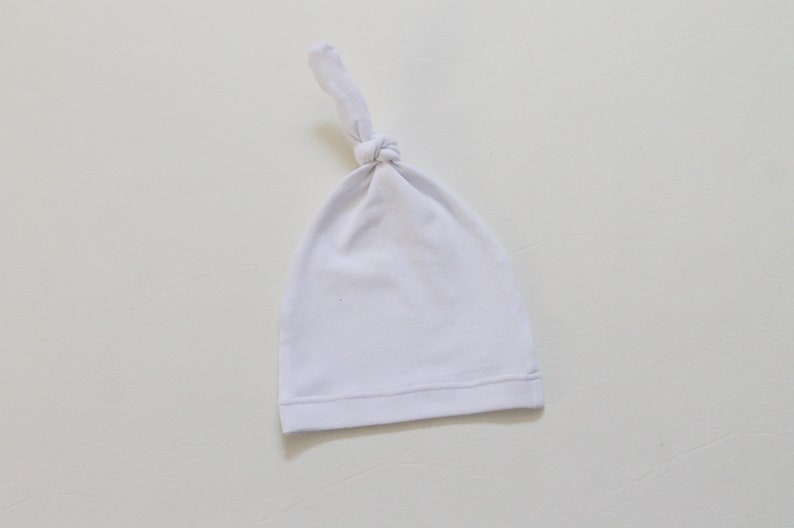 white infant hat