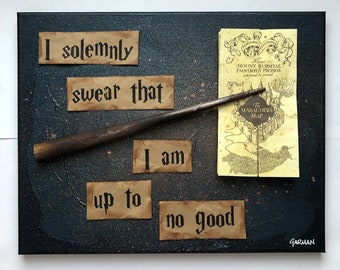 May include: A black canvas with brown paper squares with the text "I solemnly swear that I am up to no good" and a black and brown wand. The canvas also features a yellowed paper with the text "Moony Wormtail Padfoot Prongs" and "The Marauders Map".