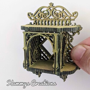 Miniature Dollhouse laser cut wooden hand painted shelf.