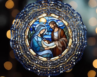 May include: A blue and gold metal wind spinner with a stained glass design of the Holy Family. The design features Mary, Joseph, and baby Jesus.