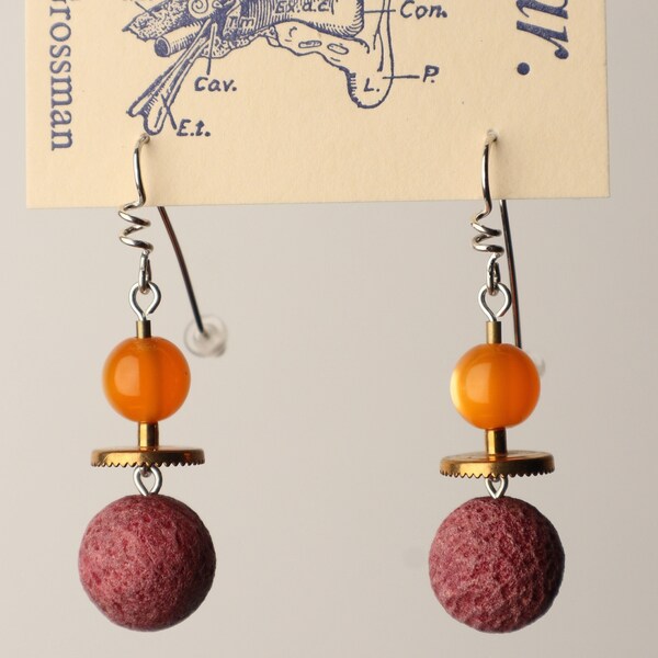 Earrings made with vintage beads and brass thingies. MCM pearly orange resin over textured burgundy glass or stone