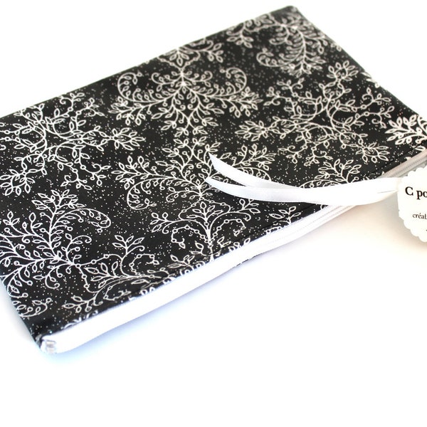 Trousse pochette masque  en toile enduite noir et blanche à paillettes