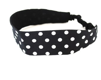 Woman's hair band with black and white polka dots