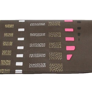 Brown and pink checkbook holder