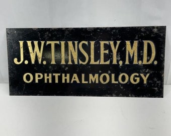 Vintage 2-Sided Hanging Eye Dr. Sign