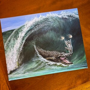 My wave raccoon surfing on a large alligator sea Croc. Artist signed print. Multiple variations. Great gift for raccoon fans. Kip and Cyrus image 4