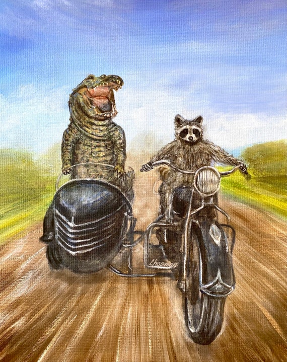 Raccoon and an alligator go for a ride on a motorcycle with a Sidecar. Kip and Cyrus go for a joyride. Original painting 16” x 20” on canvas