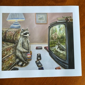 Binge watching 1998 raccoon watching crocodile hunter eating peanut butter with VCR tapes. Artist signed print. Multiple variations. image 2