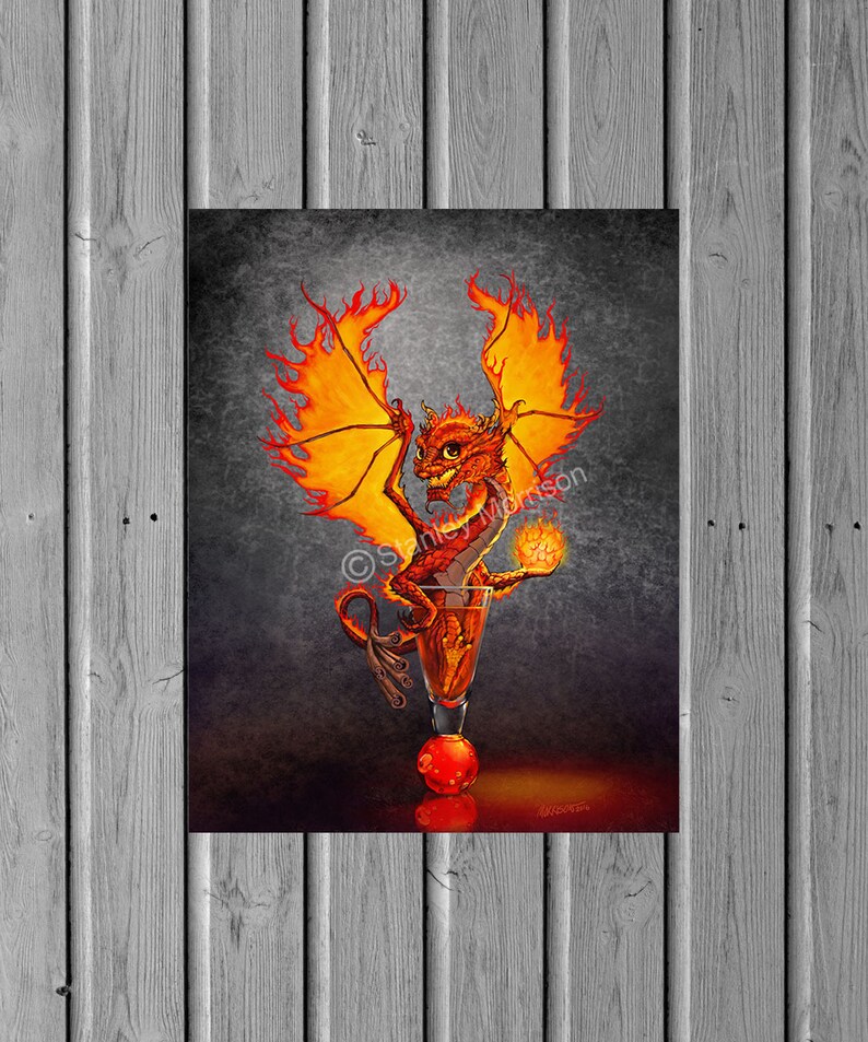 May include: A fiery orange dragon with outstretched wings sits inside a glass filled with a dark liquid. The dragon holds a small ball of fire in its hand. The background is a dark gray.