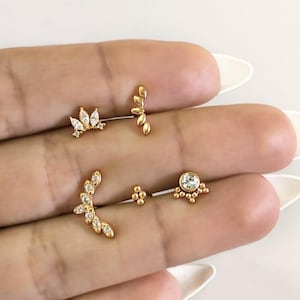 Piercings tragus hélix snug rook conch tragus lobe en acier inoxydable doré . Mini piercing oreille barre zircons et doré anti allergene