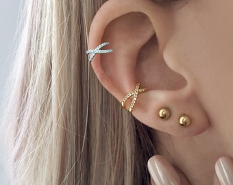 Cristal Coss ear cuff . Double crossed ear cuff in gold plated or sterling silver adorned with zircons