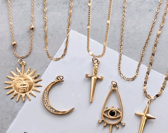 NEW- Charm and chain custom necklace in gold stainless steel . Unisex sun face amulet moon dagger sword necklace