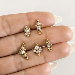 Gold zirconia opal ear piercing  helix tragus lobe snug conch in stainless steel . Dainty gold bar earring piercing hypoallergenic