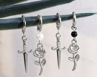 Rose and sword silver hoops earrings in stainless steel . Unisex mismatched black onyx white freshwater pearl sword & rose earrings huggies