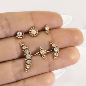 Gold zirconia opal ear piercing  helix tragus lobe snug conch in stainless steel . Dainty gold bar earring piercing hypoallergenic