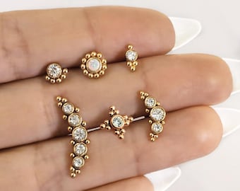 Gold zirconia opal ear piercing  helix tragus lobe snug conch in stainless steel . Dainty gold bar earring piercing hypoallergenic