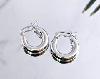 Bold chunky silver hoops earrings . Thick round stainless steel minimalist hoop earrings