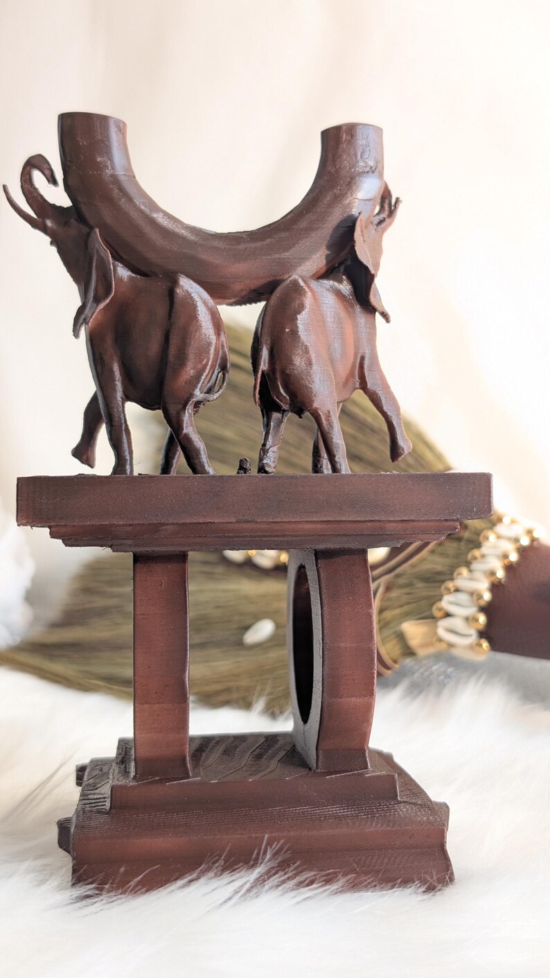 “Wedding broom display stand by African American Bridal with African-inspired elephant design for presenting or displaying a Jumping the Broom wedding broom