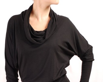 May include: A black long-sleeved shirt with a cowl neck and a fitted waist. The shirt is made of a soft, stretchy fabric and is perfect for layering.