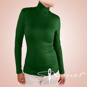 May include: A long-sleeved, dark green turtleneck shirt.