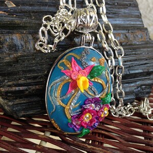 Colorful Floral Pendant on Blue Base