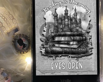 May include: A black and white image of a Kindle e-reader with a quote that reads "Reading is Dreaming with your EYES OPEN". The image features a castle and books with a vintage aesthetic.